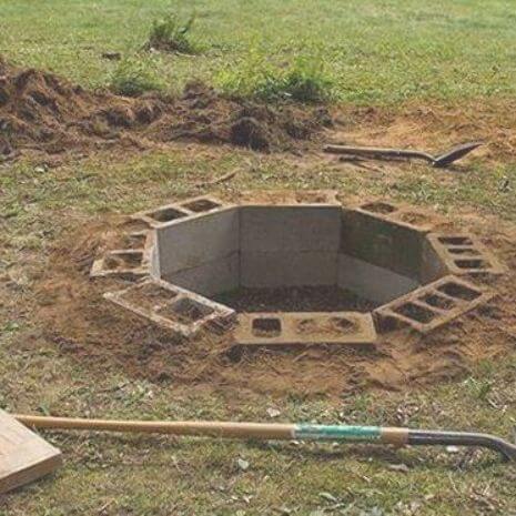 in ground fire pit made of cinder blocks